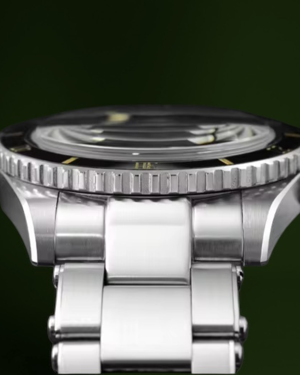 Side view of the Lonard Sonar watch highlighting its domed sapphire crystal, brushed stainless steel case, and polished bracelet against a dark green background.